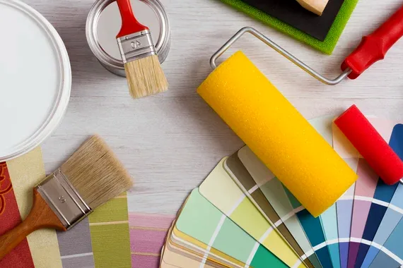 Brushes, roller and paint set out for a decorative finish in Raleigh